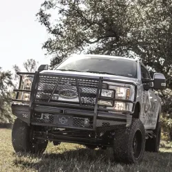 Heavy-duty truck with custom ranch hand bumper and LED lighting installed by Texas DPF & Services